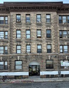 A stone-faced Allston apartment building